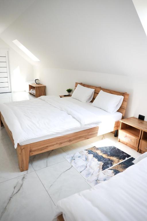 Postel nebo postele na pokoji v ubytování M-23 Hotel