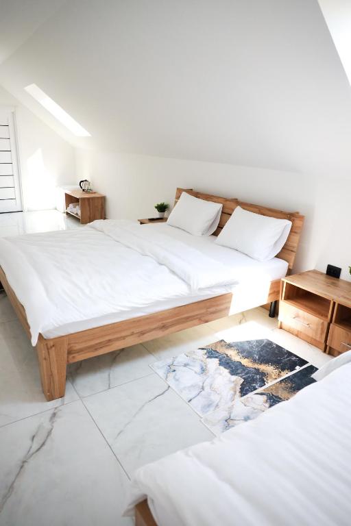 Postel nebo postele na pokoji v ubytování M-23 Hotel