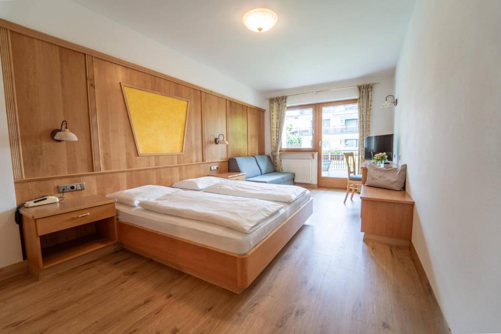 Postel nebo postele na pokoji v ubytování Hotel Birkenbrunn