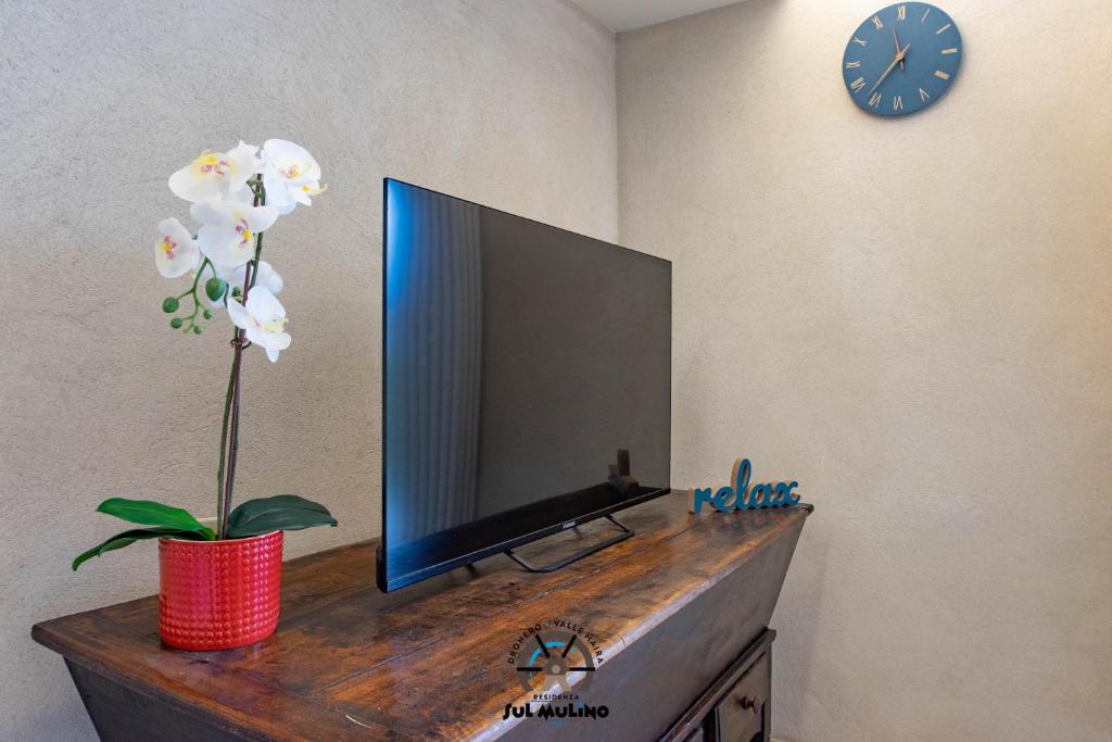 TV a/nebo společenská místnost v ubytování Residenza SUL MULINO