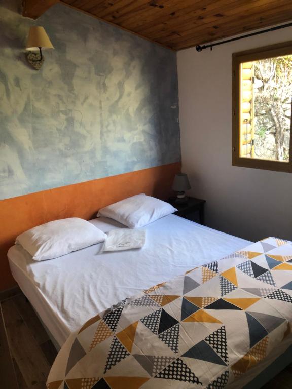 Postel nebo postele na pokoji v ubytování Chalet Les Accacias