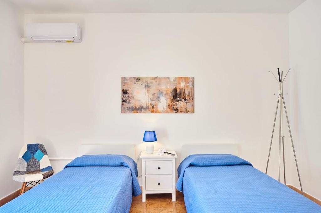 Postel nebo postele na pokoji v ubytování Tidu's home B&B