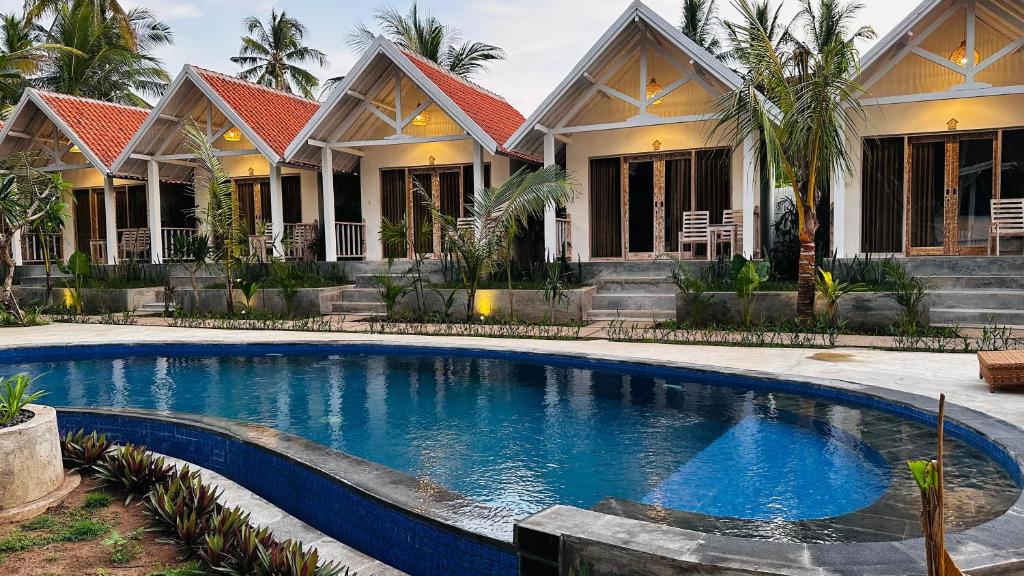 Bazén v ubytování Penida West palm cottage nebo v jeho okolí