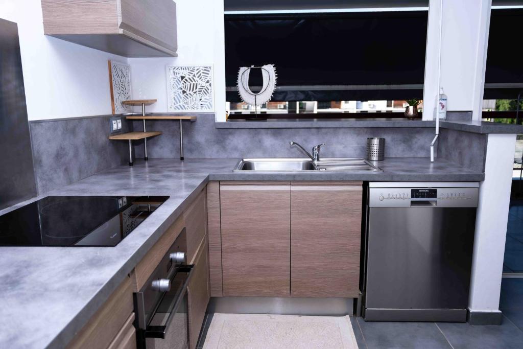 Kuchyň nebo kuchyňský kout v ubytování Comme à la maison - Spacieux T3 à 2min de la ville