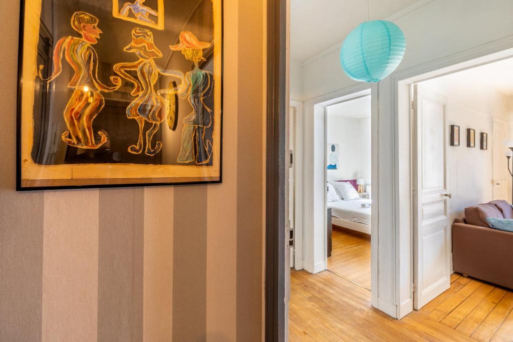 Voodi või voodid majutusasutuse GuestReady - Apt Chaleureux dans le 5e arrondissement toas