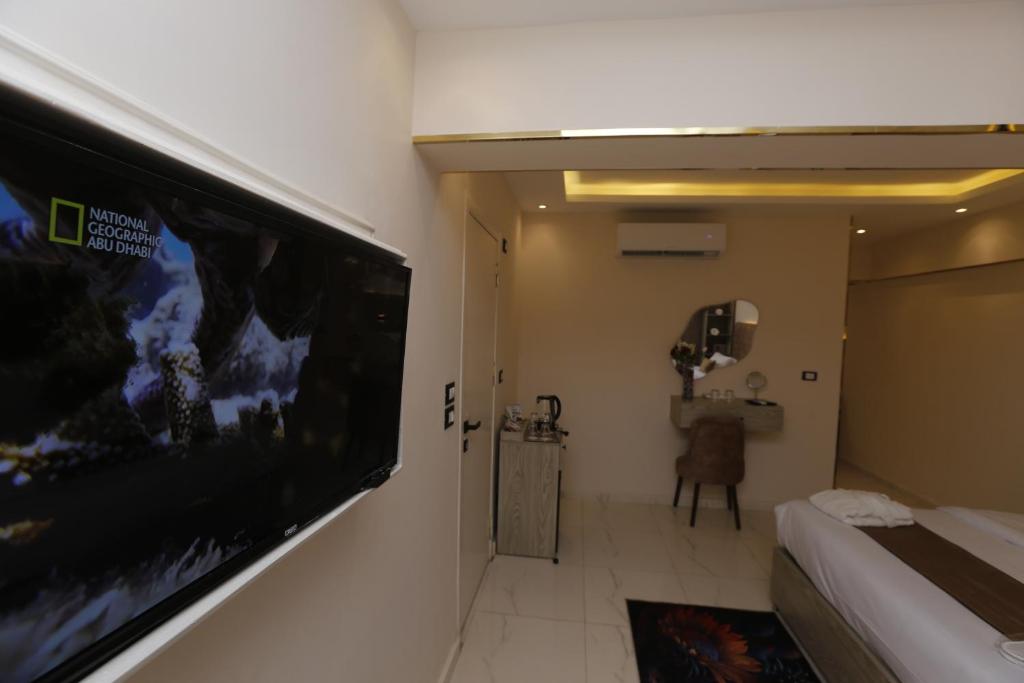 TV o dispositivi per l'intrattenimento presso Horizon Pyramids View inn