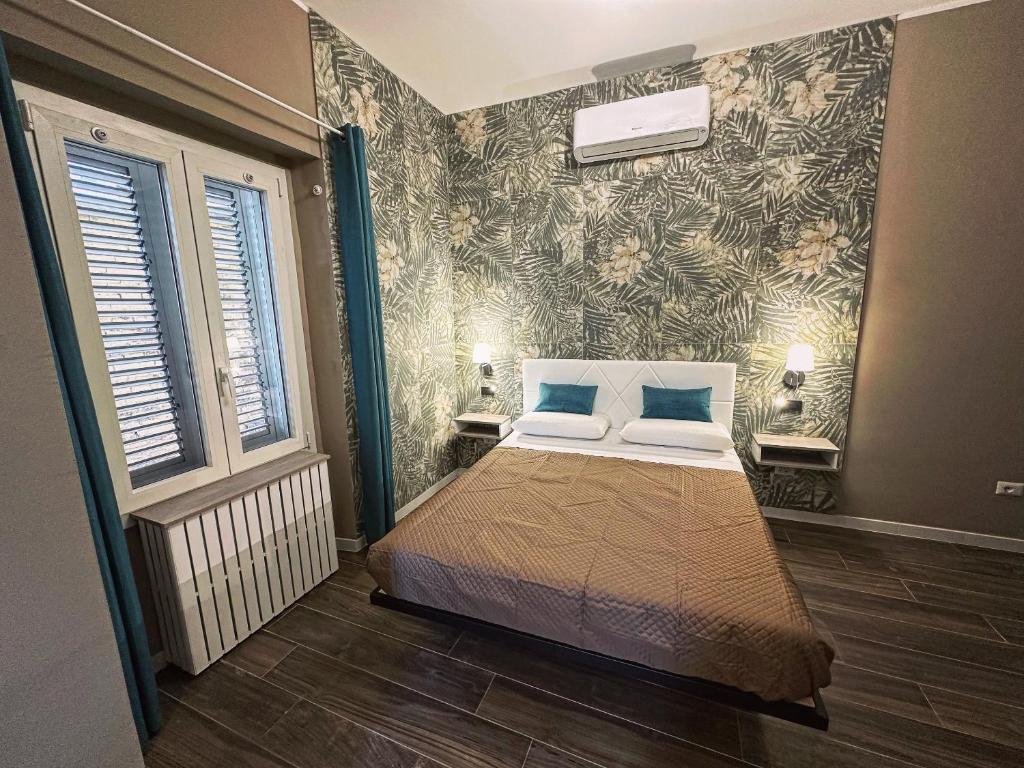 Postel nebo postele na pokoji v ubytování Central Vasto Histonium
