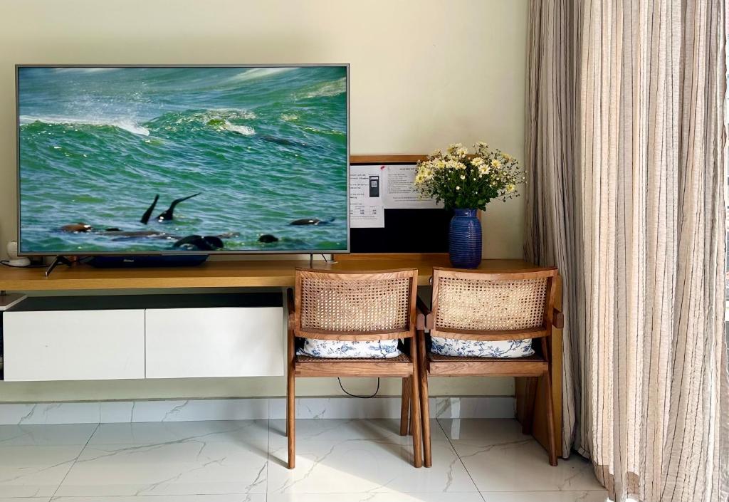 TV a/nebo společenská místnost v ubytování Papilio Homestay Tay Ho