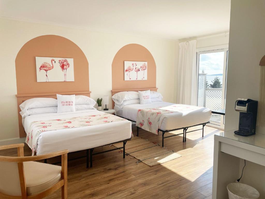 Postel nebo postele na pokoji v ubytování The Marmalade Motel