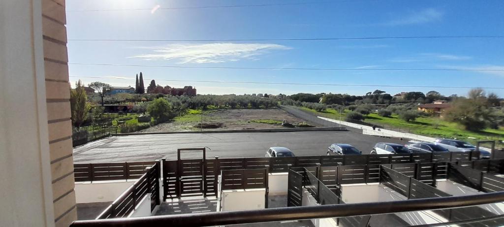 a view from a balcony of a parking lot at House 421 in Rome