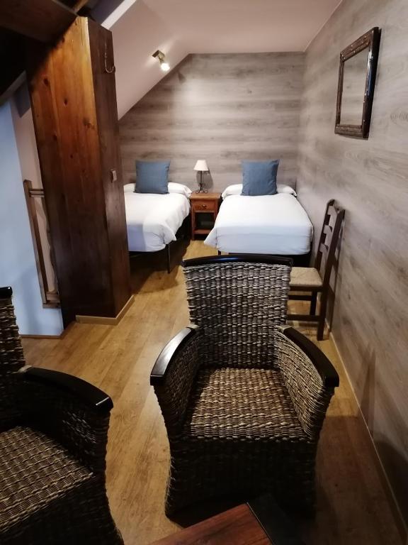 Postel nebo postele na pokoji v ubytování Hotel Casa Arcas