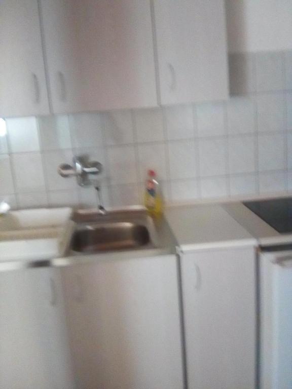 Kuchyň nebo kuchyňský kout v ubytování Ilona Vendégház