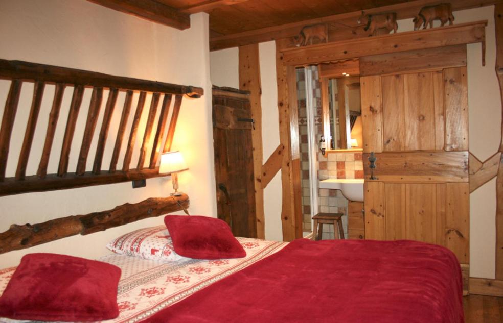 Postel nebo postele na pokoji v ubytování Hôtel Restaurant de la Chaussée