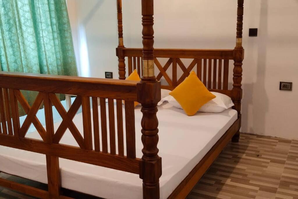 Postel nebo postele na pokoji v ubytování Holiday Home Ragama
