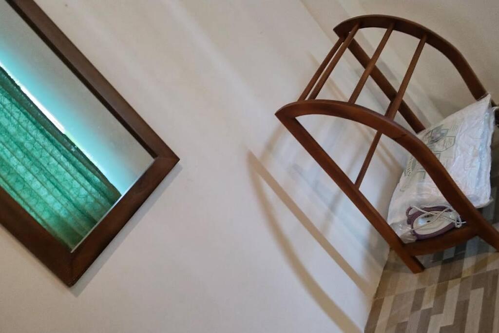 Postel nebo postele na pokoji v ubytování Holiday Home Ragama