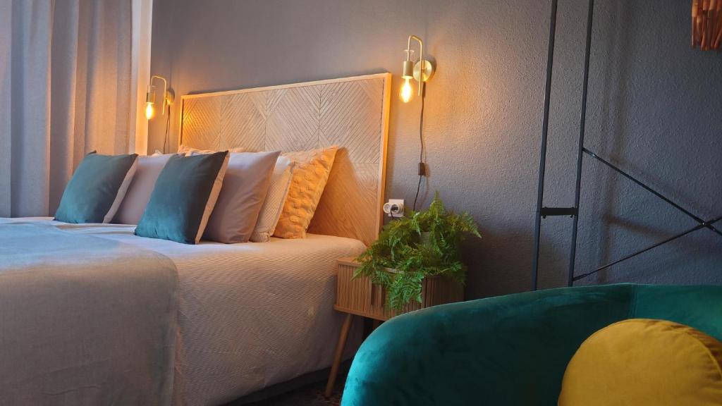 Ένα ή περισσότερα κρεβάτια σε δωμάτιο στο Carmen Apartamento Emilia