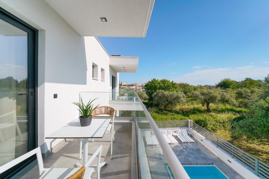 Bazén v ubytování Nuevo Suites nebo v jeho okolí