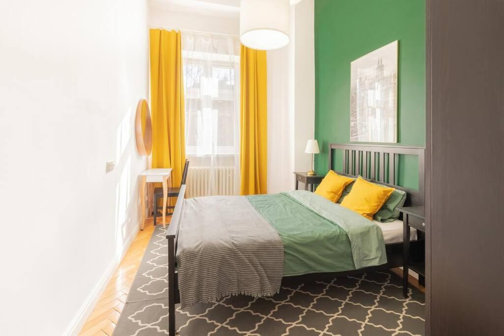 Postel nebo postele na pokoji v ubytování Wyjątkowy Apartament na Rynku