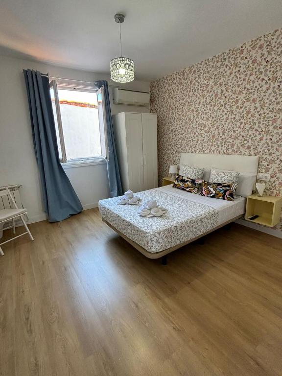 Cama o camas de una habitación en Hostal Flat55Madrid