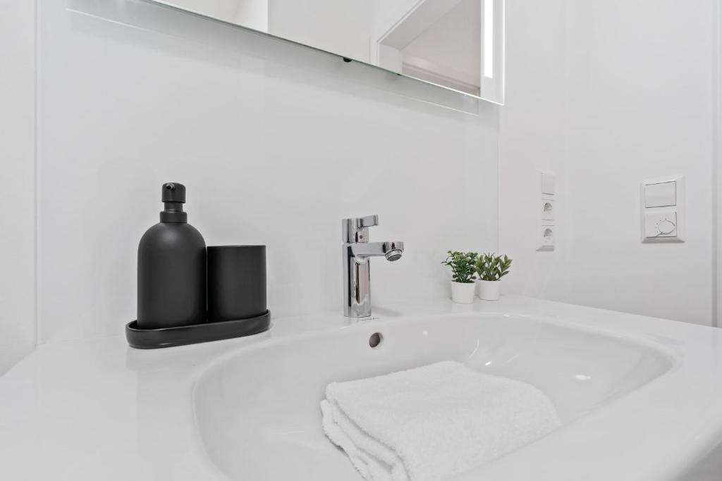 Koupelna v ubytování Modern 2BR Elegance in Bivange Residence