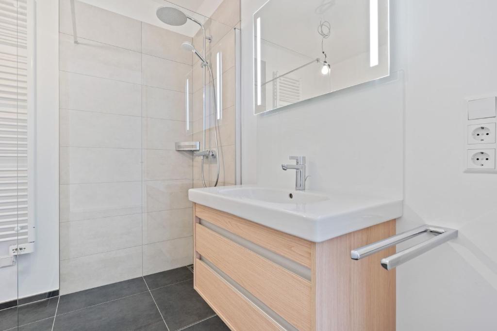 Koupelna v ubytování Modern 2BR Elegance in Bivange Residence