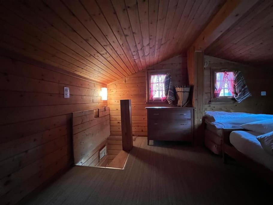 Postel nebo postele na pokoji v ubytování Chalet in Niederwald