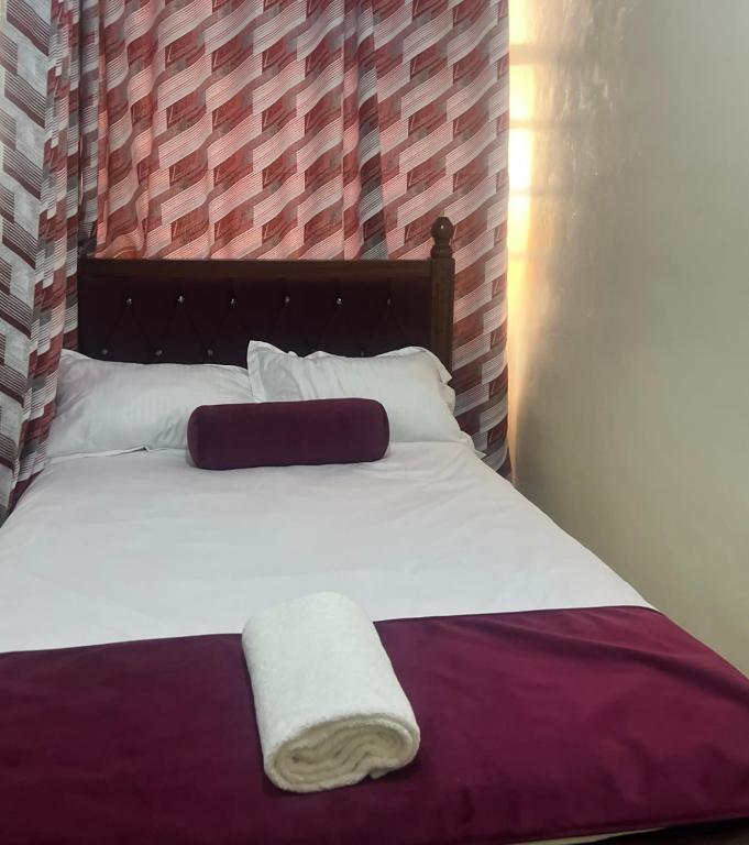 Postel nebo postele na pokoji v ubytování Kamiri Guest Stay