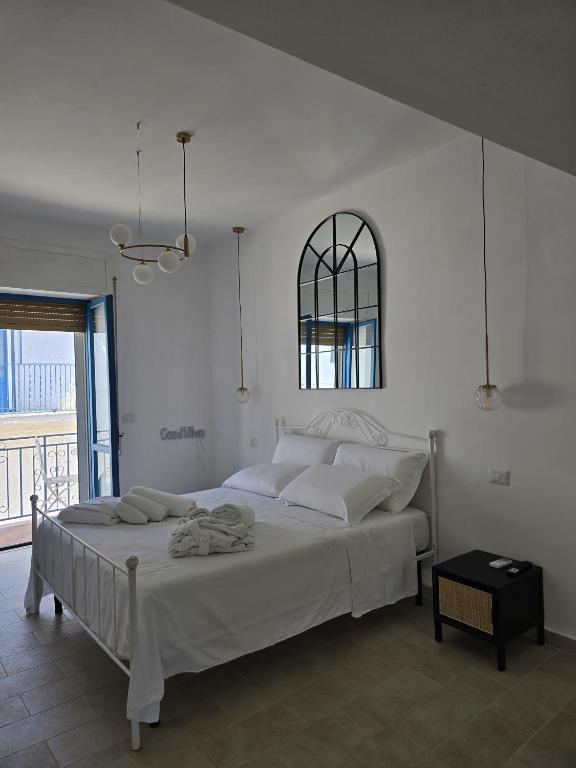 Postel nebo postele na pokoji v ubytování Terra Muronis Hotel Diffuso