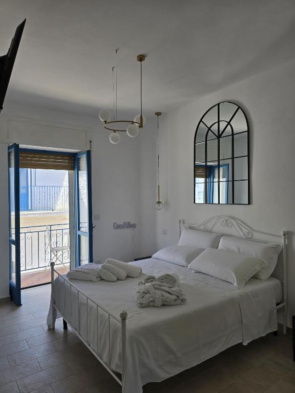 Postel nebo postele na pokoji v ubytování Terra Muronis Hotel Diffuso