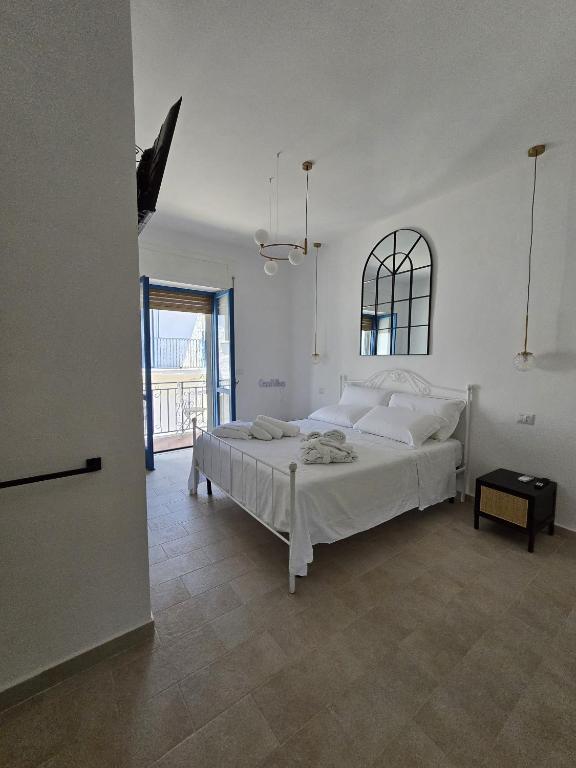 Postel nebo postele na pokoji v ubytování Terra Muronis Hotel Diffuso