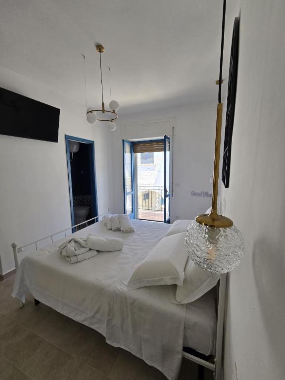 Postel nebo postele na pokoji v ubytování Terra Muronis Hotel Diffuso