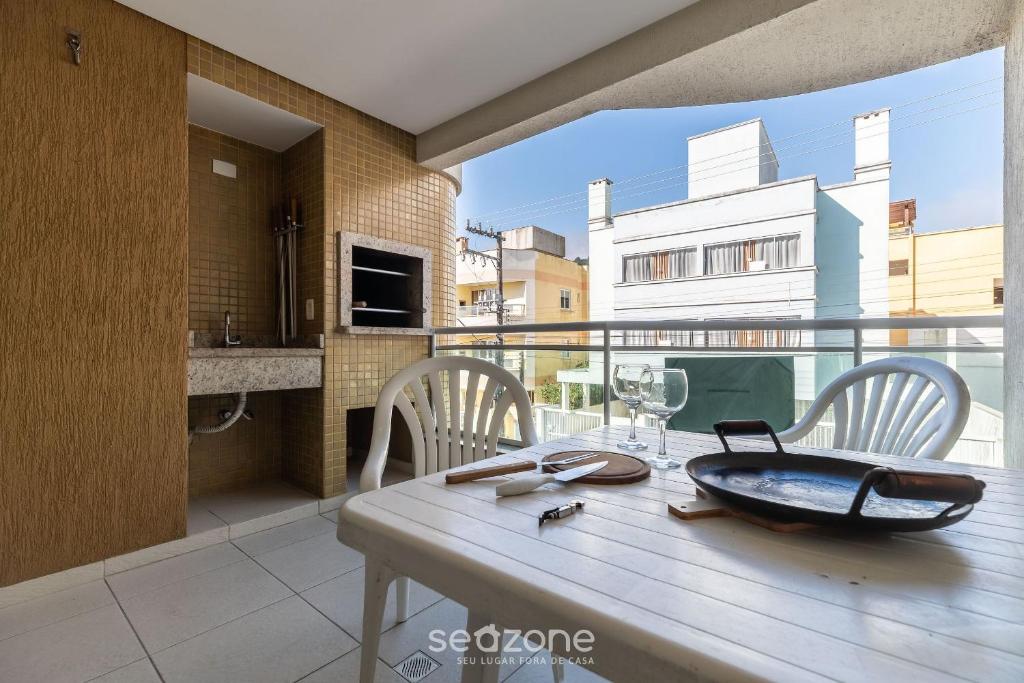 Et tv og/eller underholdning på RFO - Apartamentos a poucos passos da Praia de Bombinhas