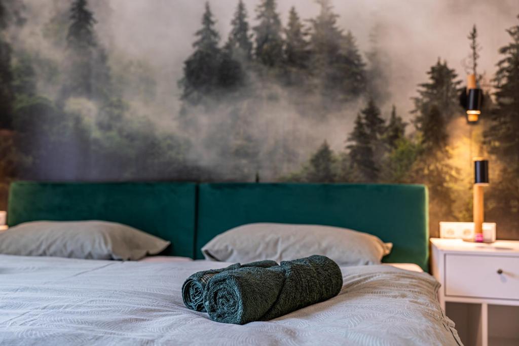 Postel nebo postele na pokoji v ubytování Luxusní apartmány Domovjanka - VELKÁ STOLOVÁ a MALÁ STOLOVÁ