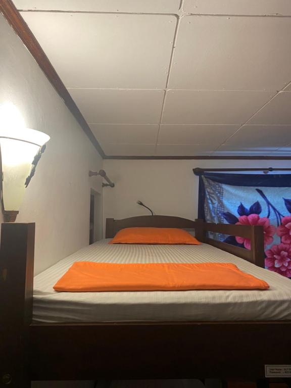Postel nebo postele na pokoji v ubytování Sky Hostel Negombo