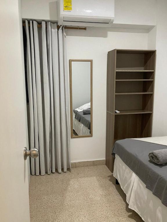 Postel nebo postele na pokoji v ubytování Habitaciones privadas en un departamento encantador