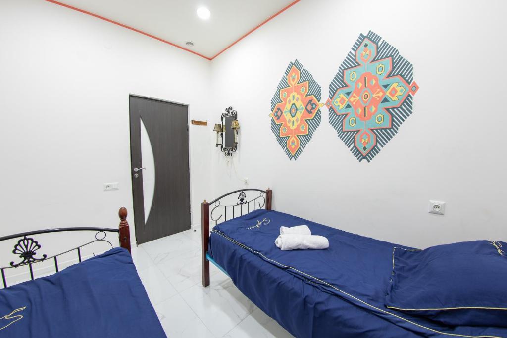 Postel nebo postele na pokoji v ubytování Armena Hostel
