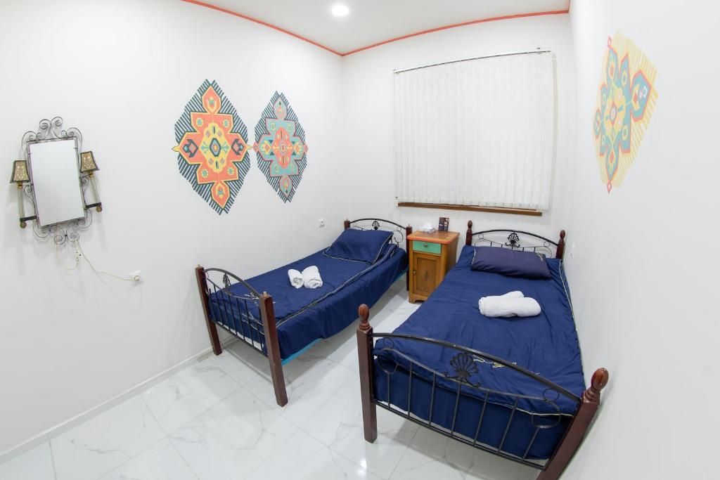Postel nebo postele na pokoji v ubytování Armena Hostel