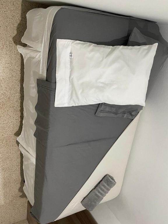 Postel nebo postele na pokoji v ubytování Habitaciones privadas en un departamento encantador