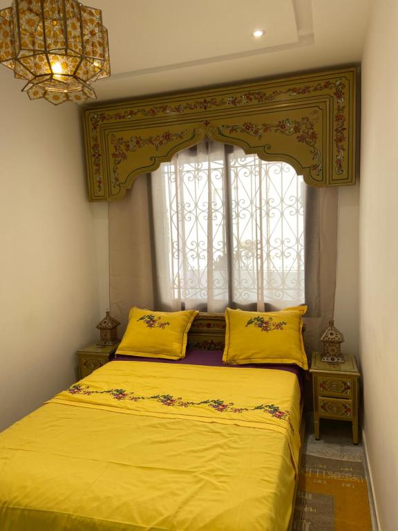 Postel nebo postele na pokoji v ubytování Marsa - Sidi Bousaid Lovely Authentic Apartment