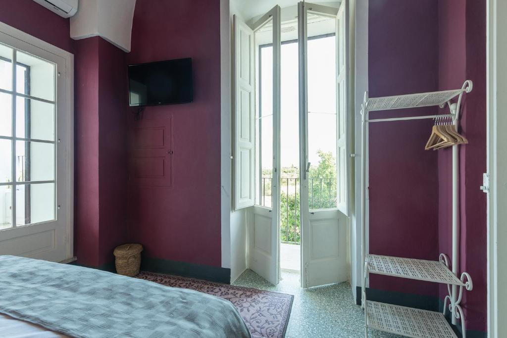 Postel nebo postele na pokoji v ubytování Masseria La Presentina