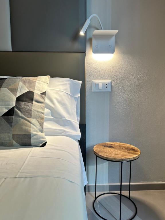 Postel nebo postele na pokoji v ubytování Anastasi Hotel e Residence