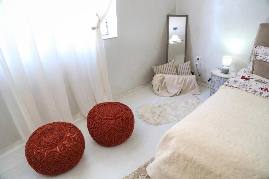 Una cama o camas en una habitación de Apartman Nikšić