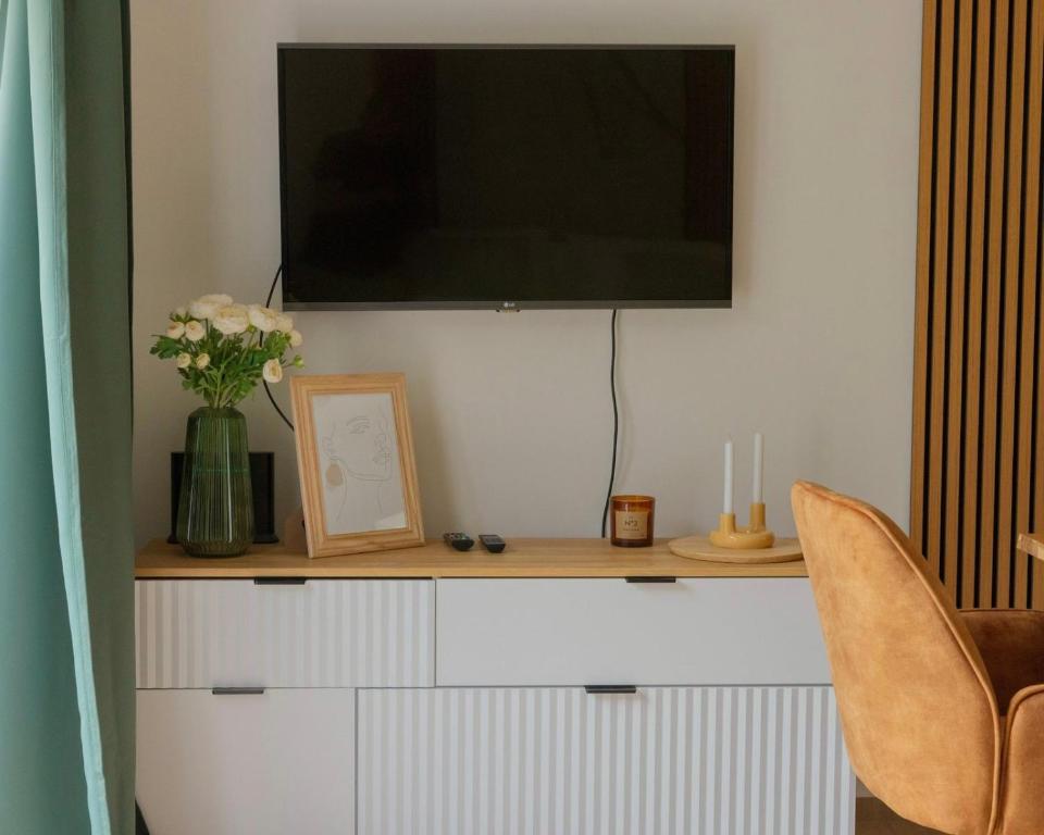 TV a/nebo společenská místnost v ubytování Nyárfás Panoráma Vendégház