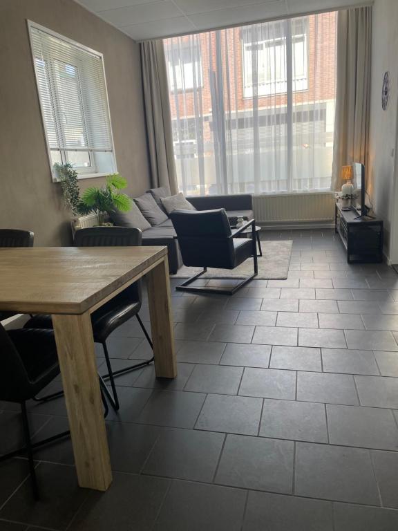 Χώρος καθιστικού στο Stadsappartement Valkhof
