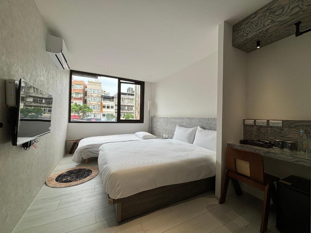 Voodi või voodid majutusasutuse Lai Jie Accommodation新北市民宿411號 toas
