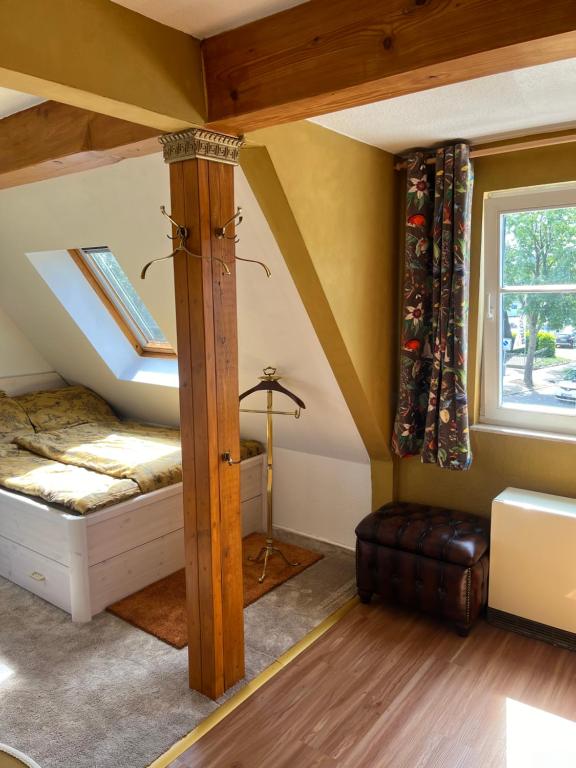 Postel nebo postele na pokoji v ubytování cafesahne u Pension