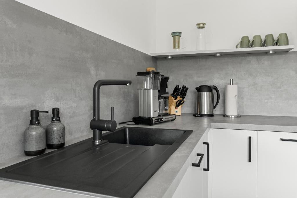 Küche/Küchenzeile in der Unterkunft Neubau! Ökologischer Wellnessurlaub in der Eifel