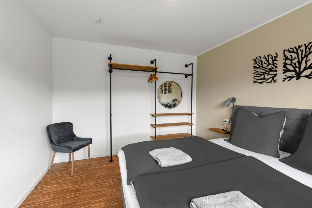 Ein Bett oder Betten in einem Zimmer der Unterkunft Neubau! Ökologischer Wellnessurlaub in der Eifel