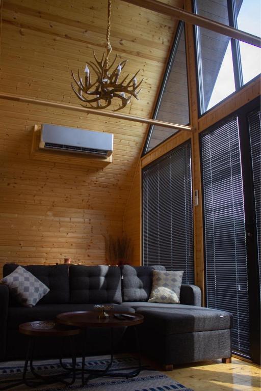 Posezení v ubytování Cottage KOLKHA