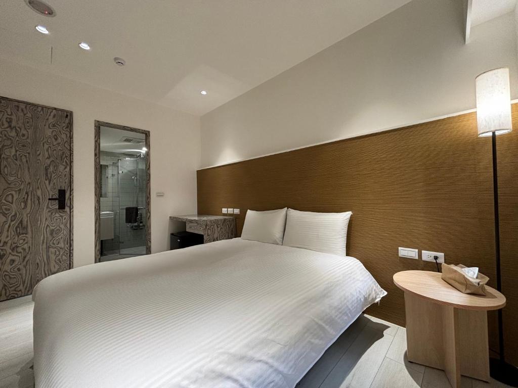 Voodi või voodid majutusasutuse Lai Jie Accommodation新北市民宿411號 toas